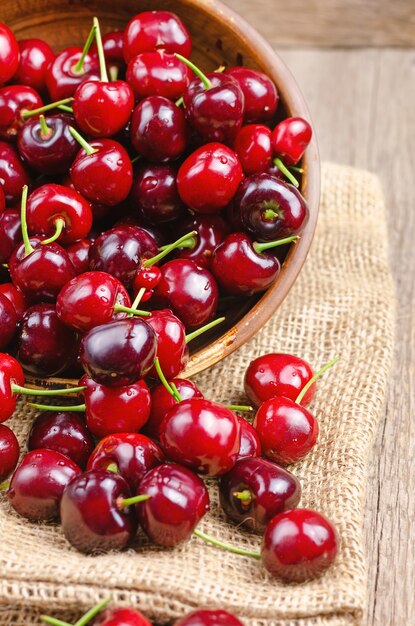 Fresh cherry on wooden table.