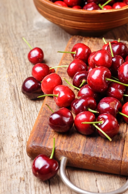 Fresh cherry on wooden table.