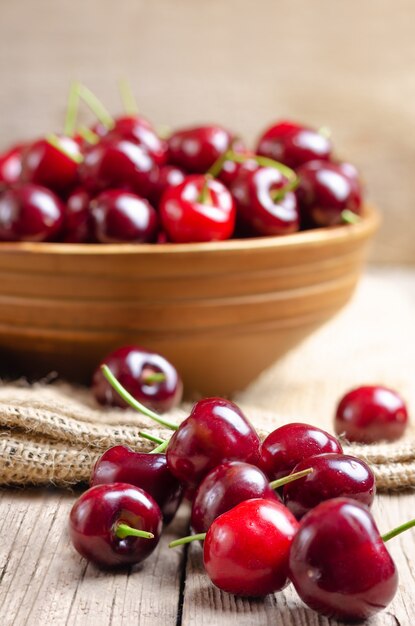 Fresh cherry on wooden .