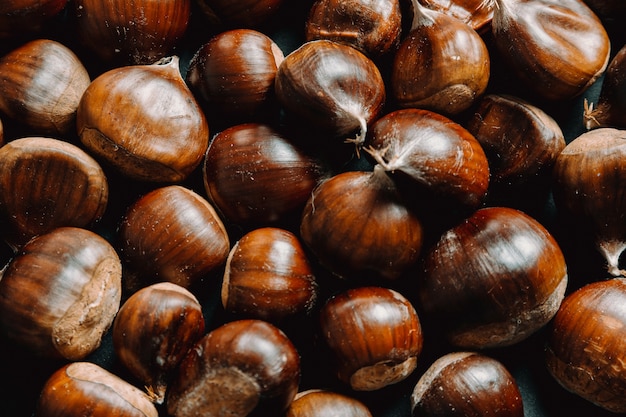 Fresh chestnuts in nature background