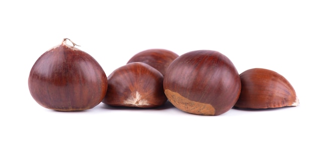 Fresh chestnuts with peeled roasted chestnut isolated on white . Hippocastanum isolated