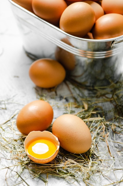 Fresh chicken eggs in a bucket