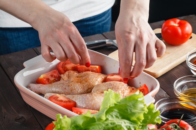 Fresh chicken meat on wooden table. Selective focus. Rustic style.