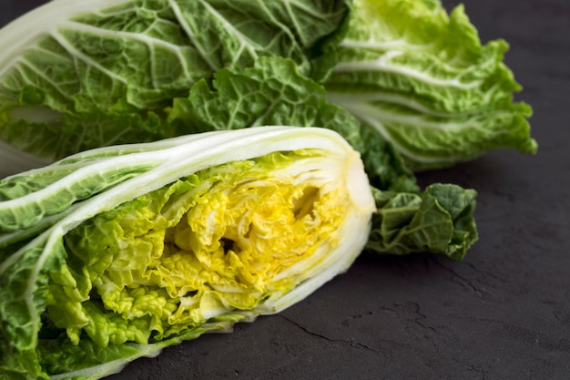 Fresh Chinese cabbage on a gray background.