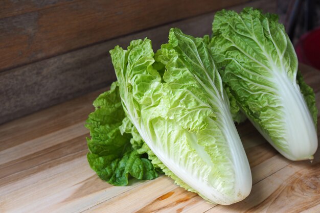 Fresh chinese cabbage on wooden table background