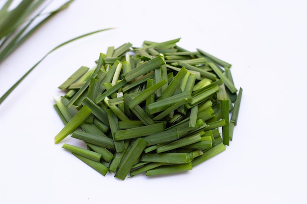 Fresh Chinese Chive leaves on white background.