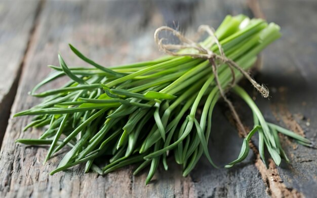 fresh chive on dark wooden table