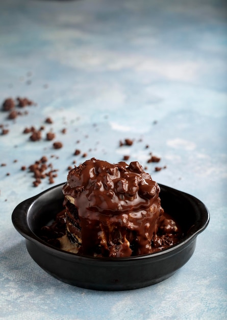 Fresh chocolate jar isolated on grey background side view