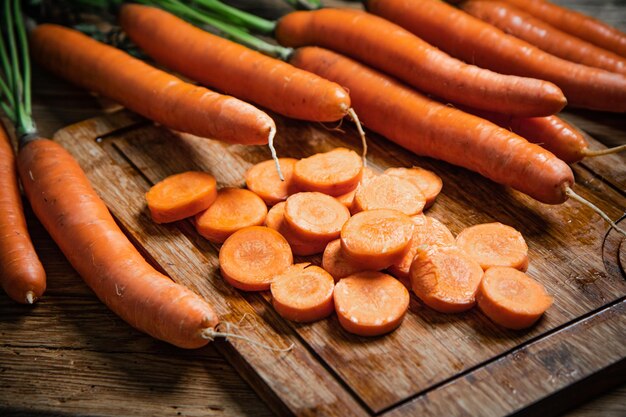 Fresh chopped carrots on a cutting board