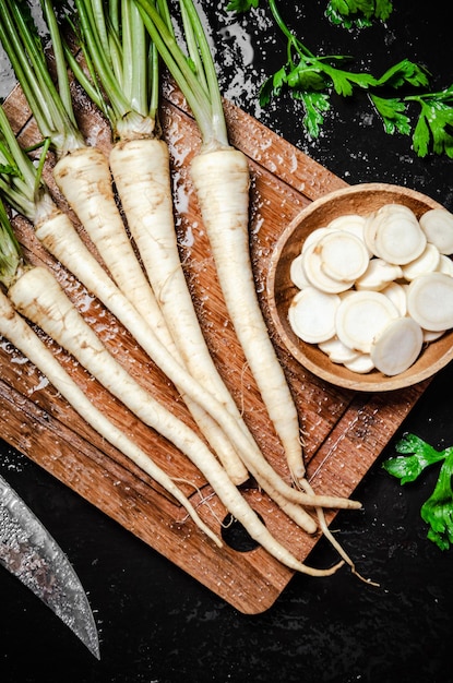 Fresh chopped parsley root On table