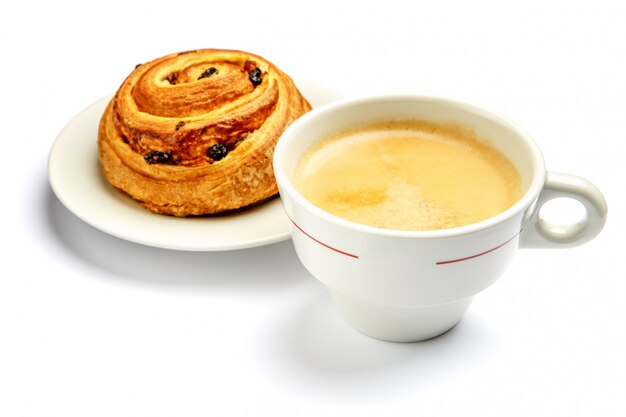 Fresh cinnabon and coffee on white background