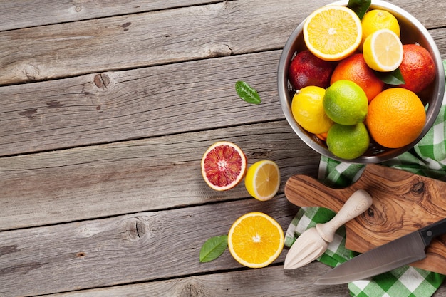 Fresh citrus fruits in colander