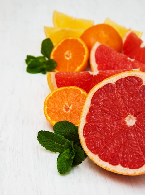 Fresh citrus fruits with green mint