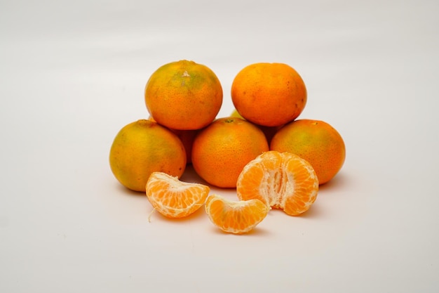 Fresh clementines fruit isolated on white background