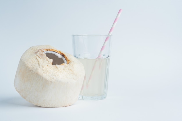 Fresh coconut and coconut milk in trasparent glass