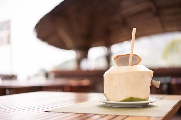 Fresh coconut at the tropical resort beach bar