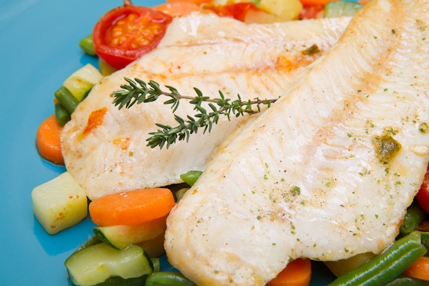 Fresh cod on bed of mixed vegetables