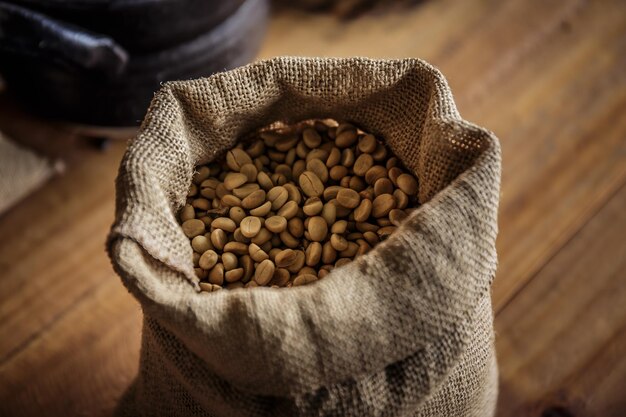 Fresh coffee beans in cloth bags