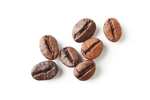 Fresh coffee seeds isolated on white