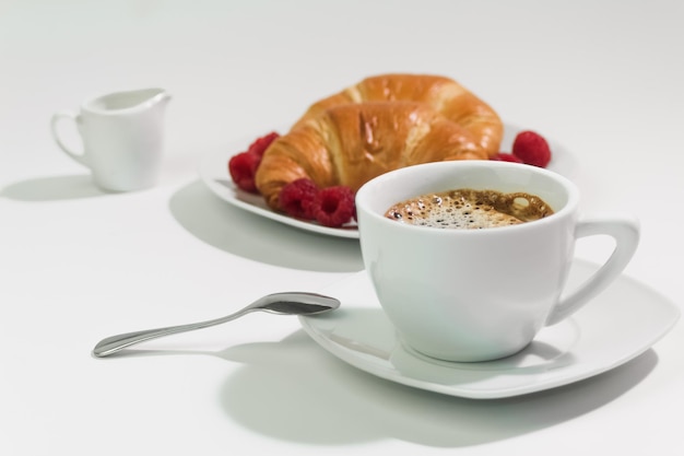 Fresh coffee in white cup breakfast concept