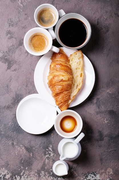 Fresh coffee with croissant