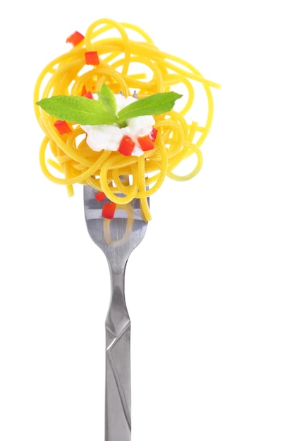 Fresh colorful composition with pasta on fork isolated on white