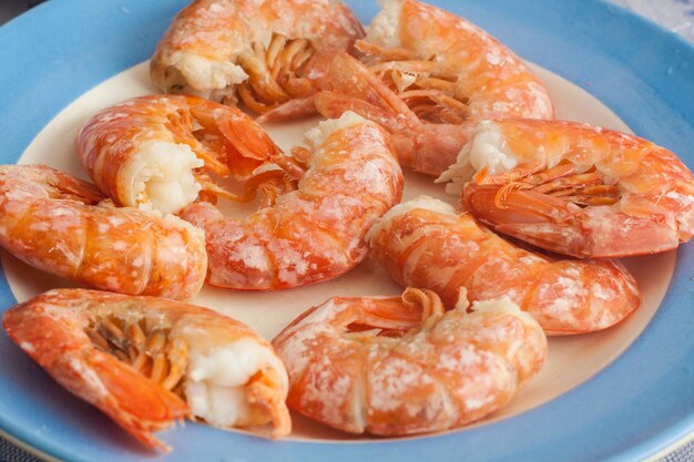 Fresh cooked lagoustines on the plate Seafood menu