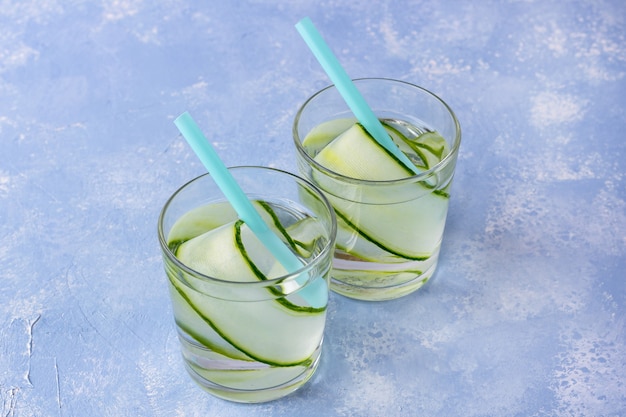 Fresh cool detox drink with cucumber, lemonade in a glass