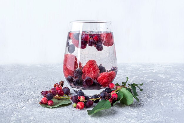 Fresh cool detox drink with various berries