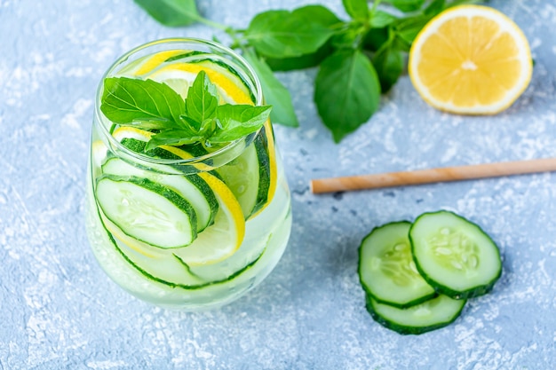 Fresh cool detox water drink with cucumber and lemon.