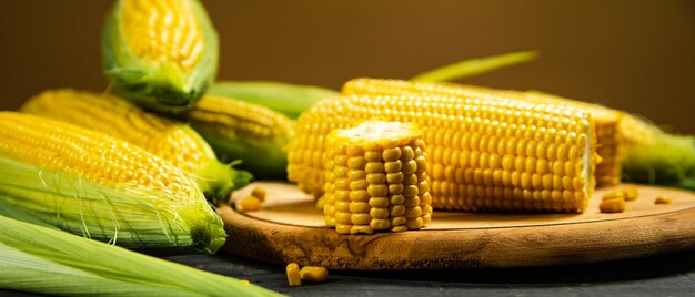 Fresh corn on a cutting board