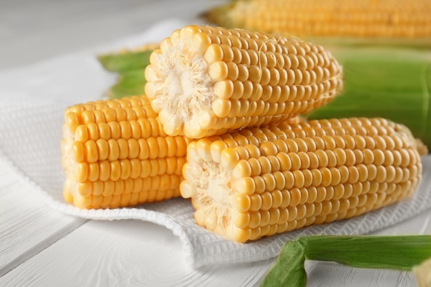 Fresh corncobs on napkin closeup