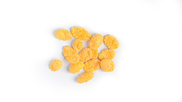 Fresh cornflakes on a white background