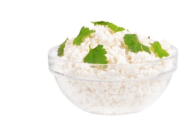 Fresh cottage cheese (curd) in glass bow, isolated on white background .