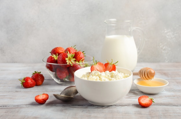 Fresh cottage cheese with fresh strawberries