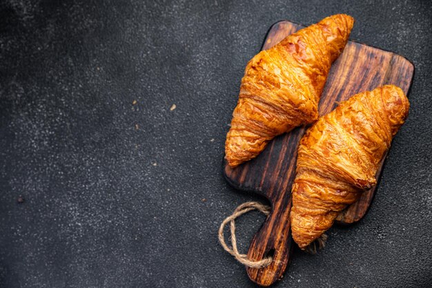 fresh croissant hot pastries French cuisine healthy meal food snack on the table copy space food