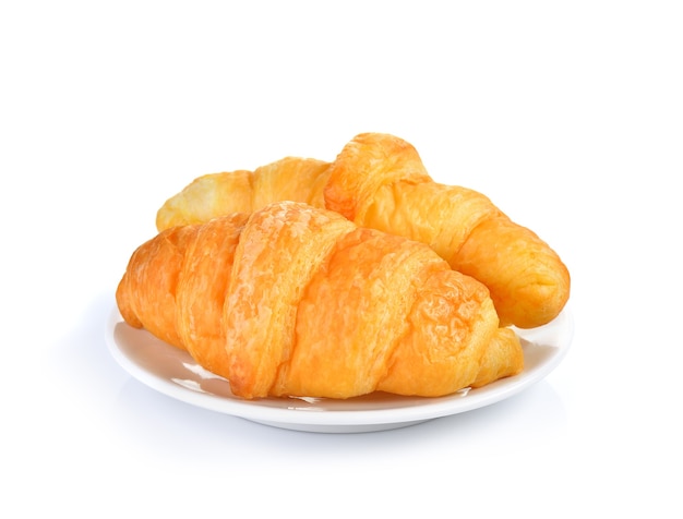 Fresh croissant on white