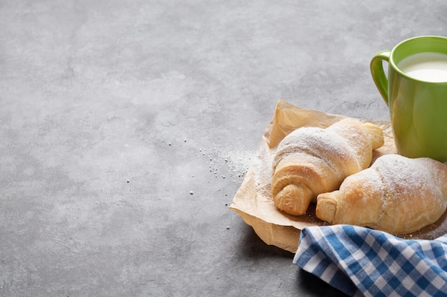 Fresh croissants and milk