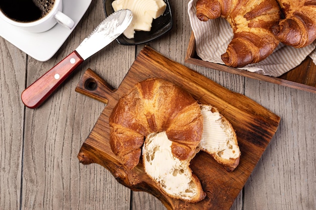 Fresh croissants with butter