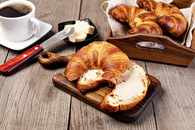 Fresh croissants with butter
