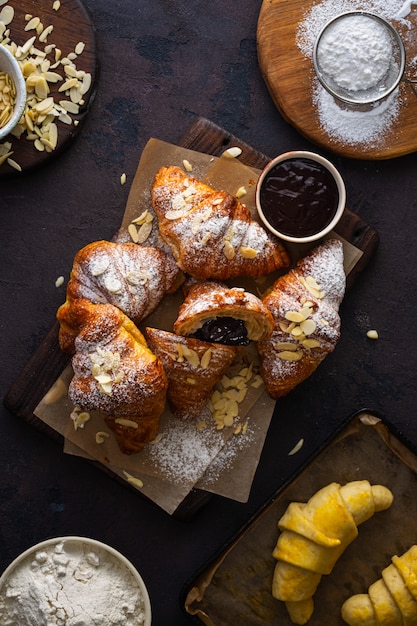 Fresh croissants with chocolate top view