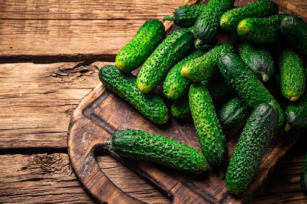 Fresh cucumbers on a cutting board