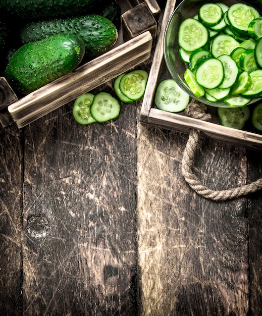 Fresh cucumbers in an old box