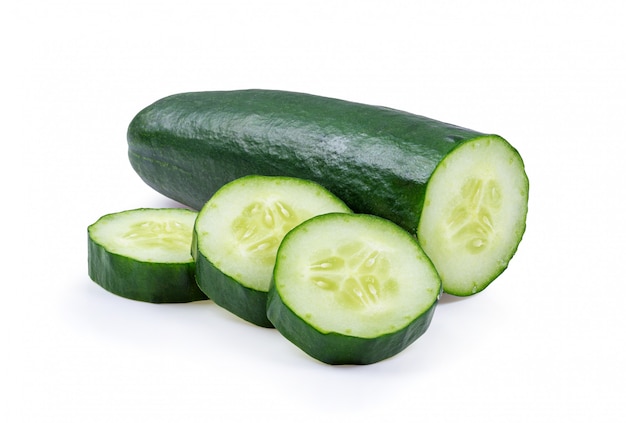 Fresh cucumbers on white table