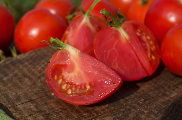 Fresh cut tomato  on wooden table