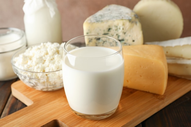 Fresh dairy products on cutting board