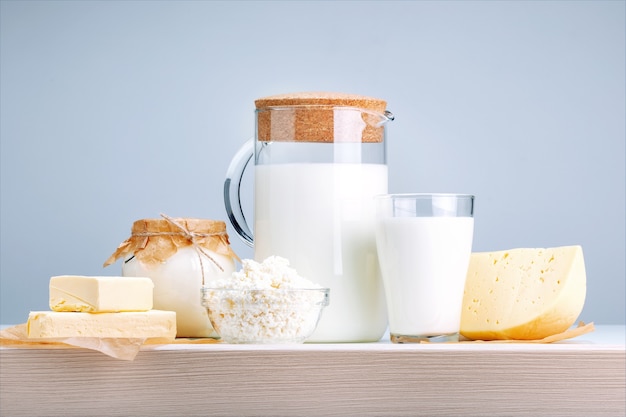 Fresh dairy products on kitchen table.