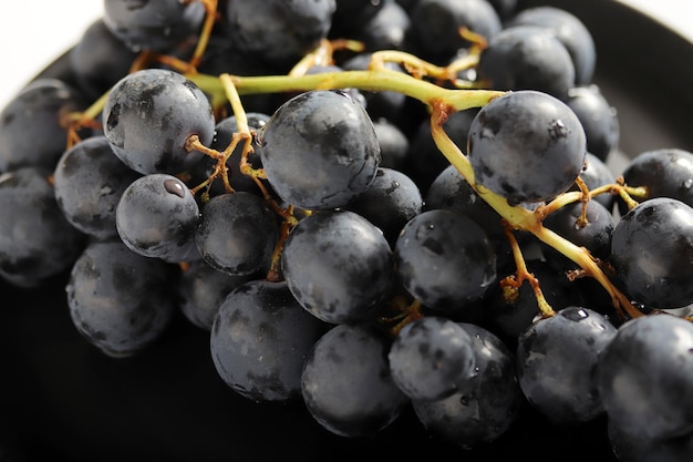 Fresh dark red grapes close up