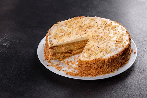 Fresh delicious carrot cake with cream