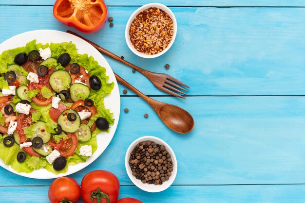 Fresh, delicious Greek salad with feta cheese. Copy space.